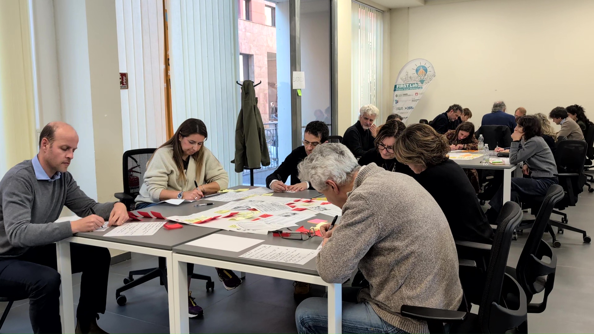 I docenti Unifi a lezione di IA (Fonte foto comunicato stampa Università degli Studi di Firenze)