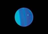 Urano col suo satellite Ariel in una immagine dal sito della Nasa